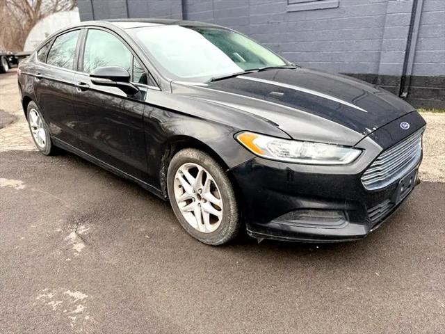 used 2014 Ford Fusion car, priced at $7,495