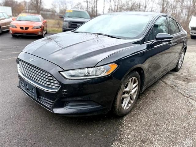 used 2014 Ford Fusion car, priced at $7,495