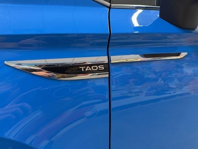 used 2023 Volkswagen Taos car, priced at $20,495
