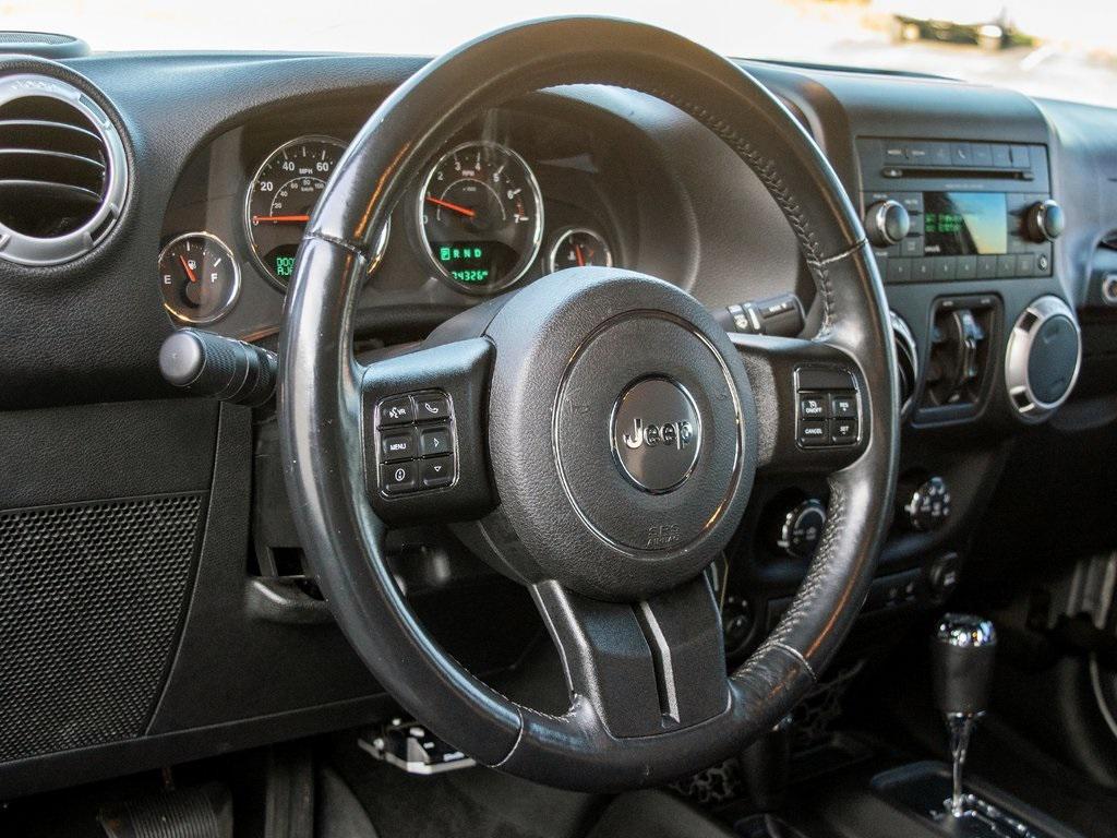 used 2015 Jeep Wrangler Unlimited car, priced at $18,899