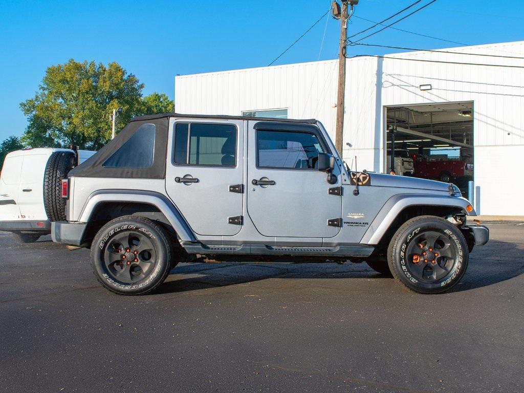 used 2015 Jeep Wrangler Unlimited car, priced at $18,899