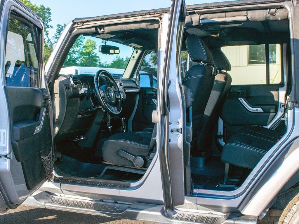 used 2015 Jeep Wrangler Unlimited car, priced at $18,899