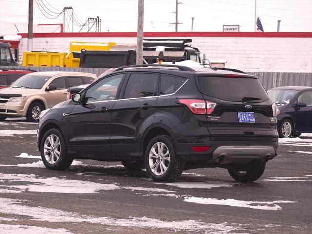 used 2018 Ford Escape car, priced at $13,988