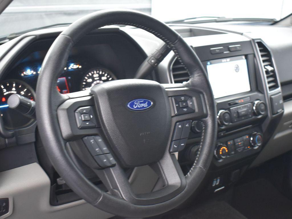 used 2018 Ford F-150 car, priced at $26,599