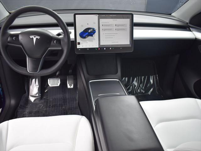 used 2023 Tesla Model Y car, priced at $33,902