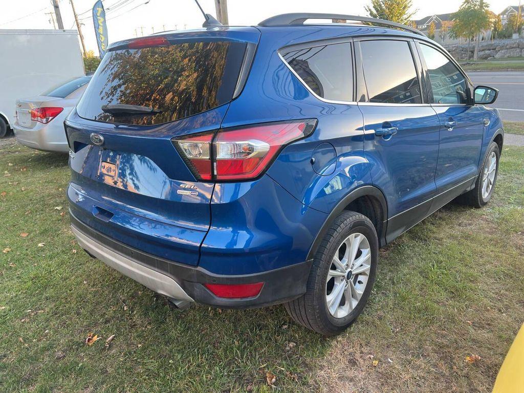 used 2018 Ford Escape car, priced at $12,580