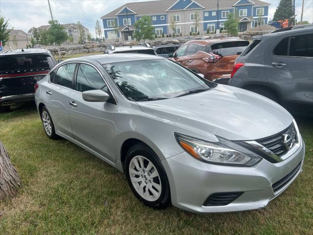 used 2018 Nissan Altima car, priced at $9,990