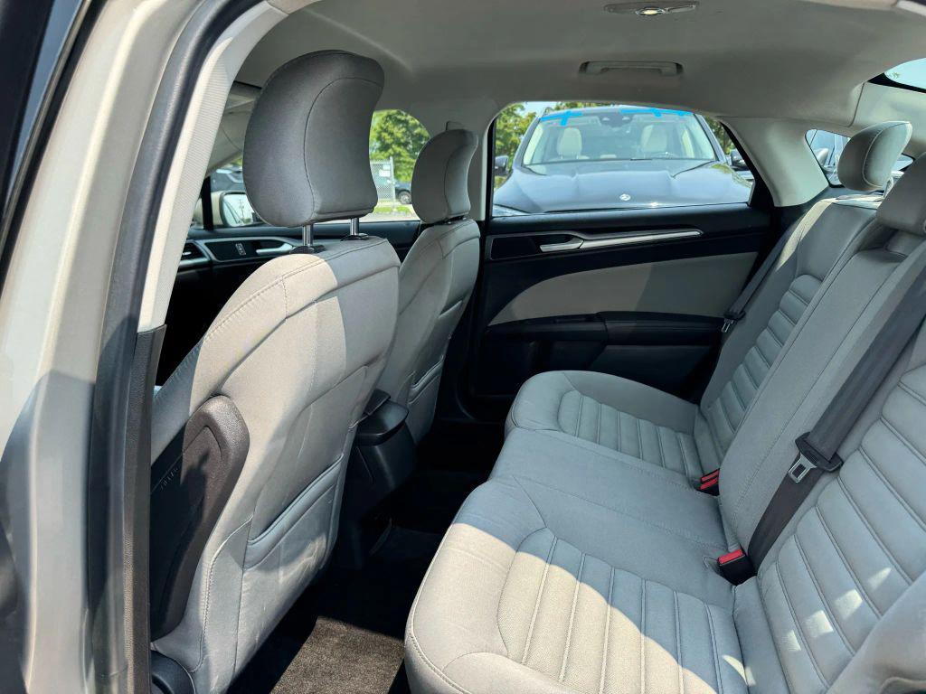used 2015 Ford Fusion car, priced at $3,495