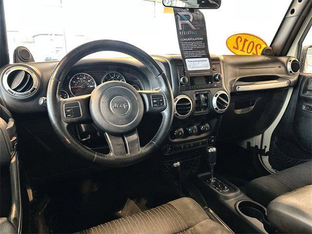 used 2012 Jeep Wrangler Unlimited car, priced at $16,988