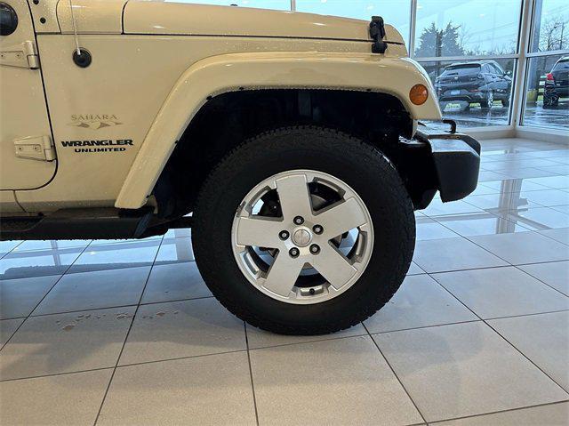 used 2012 Jeep Wrangler Unlimited car, priced at $16,988