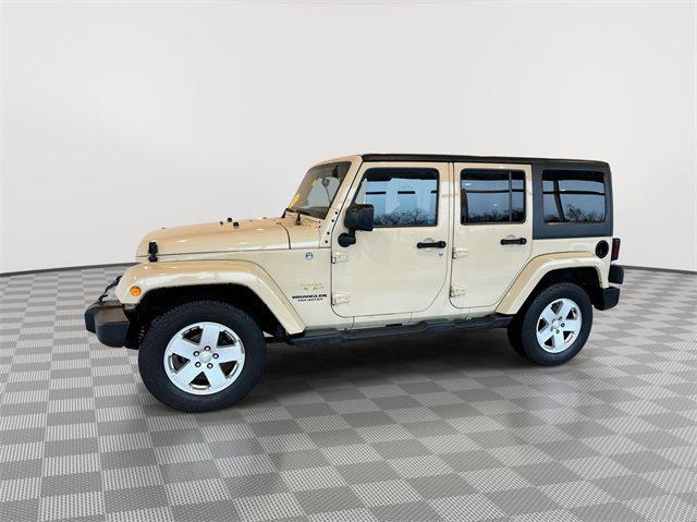 used 2012 Jeep Wrangler Unlimited car, priced at $16,988