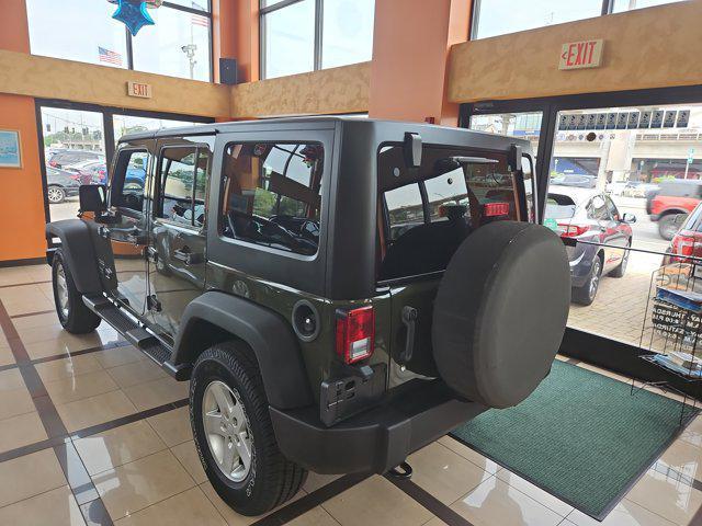 used 2015 Jeep Wrangler Unlimited car, priced at $28,895