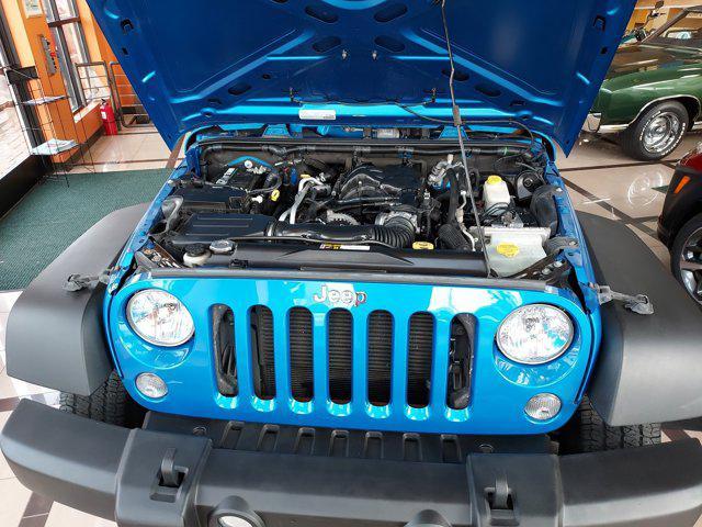 used 2015 Jeep Wrangler car, priced at $23,895