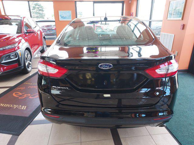 used 2016 Ford Fusion car, priced at $19,495