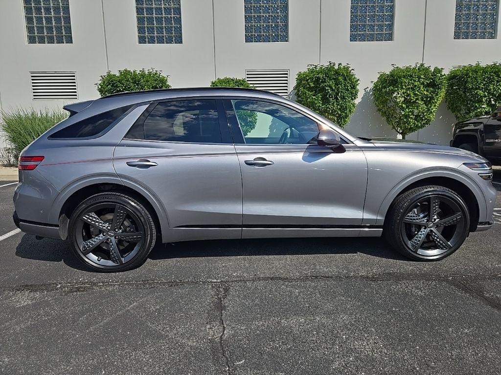 used 2024 Genesis GV70 car, priced at $54,635