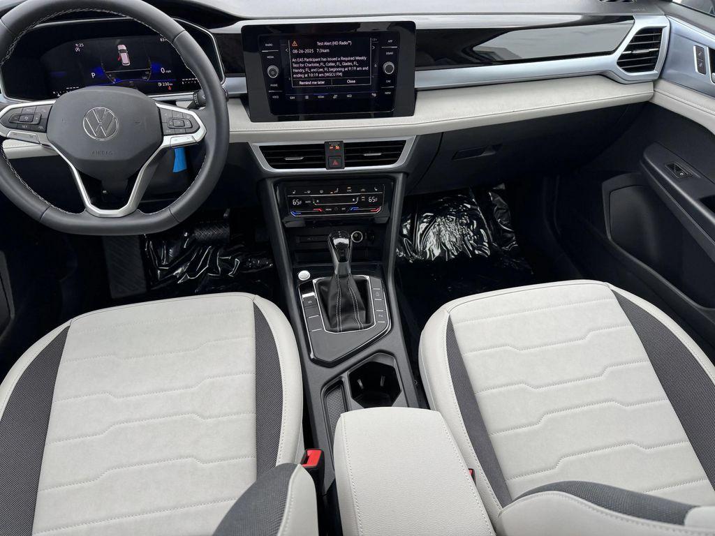new 2025 Volkswagen Taos car, priced at $27,923