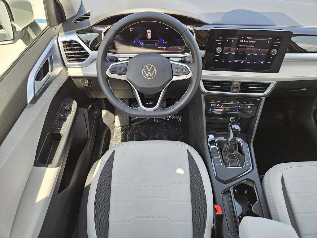 new 2025 Volkswagen Taos car, priced at $26,996