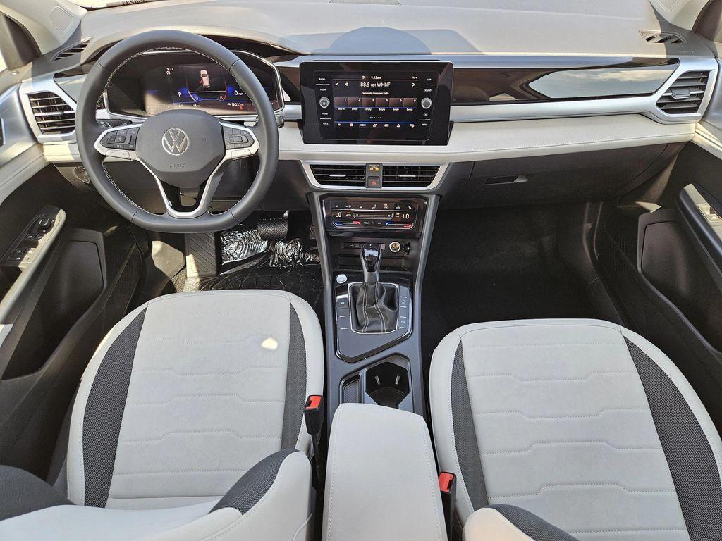 new 2025 Volkswagen Taos car, priced at $26,996