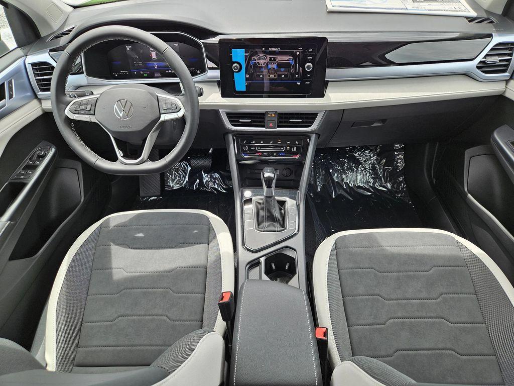 new 2025 Volkswagen Taos car, priced at $27,328