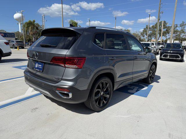 used 2023 Volkswagen Taos car, priced at $22,689