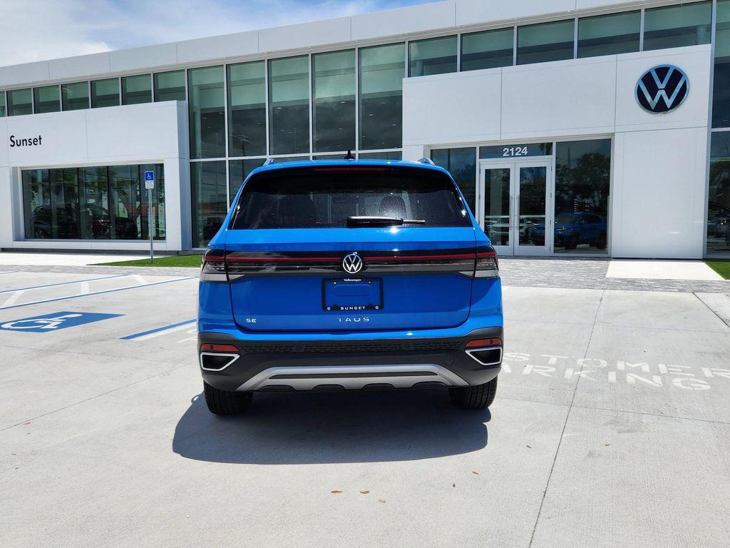 new 2025 Volkswagen Taos car, priced at $26,933