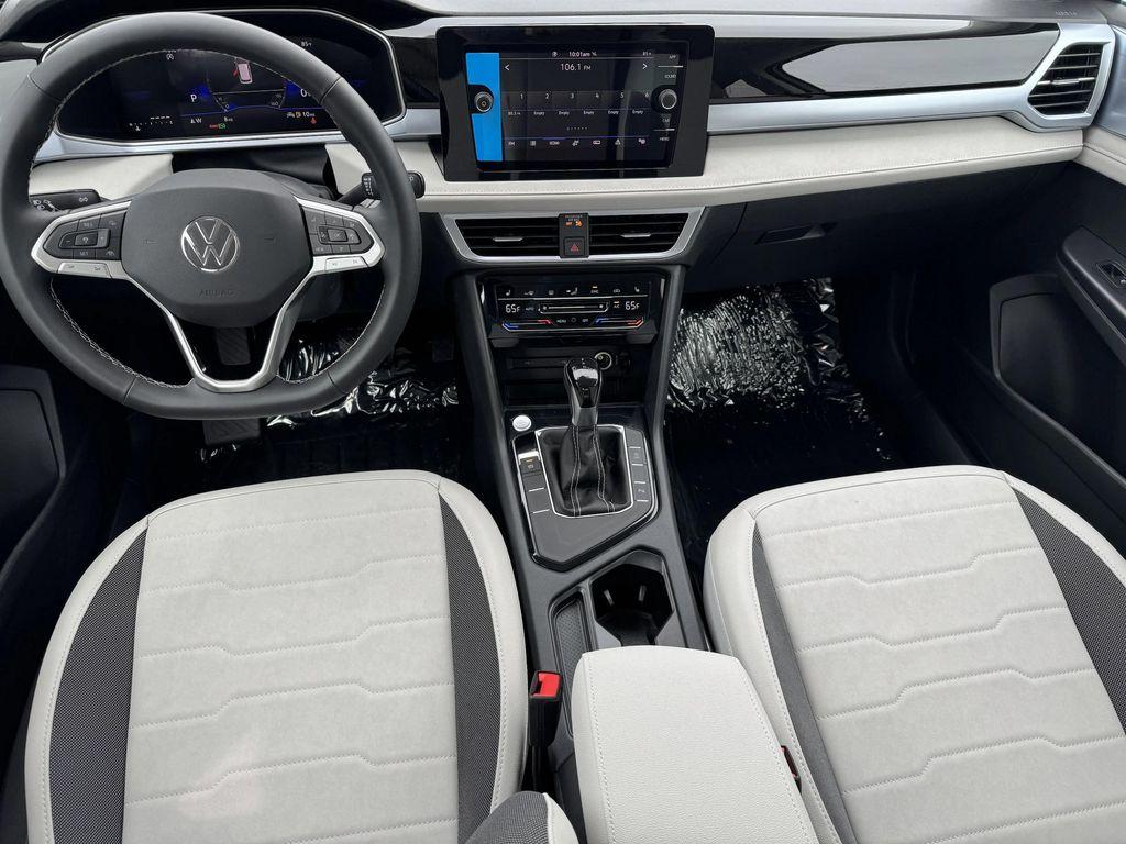 new 2025 Volkswagen Taos car, priced at $27,923