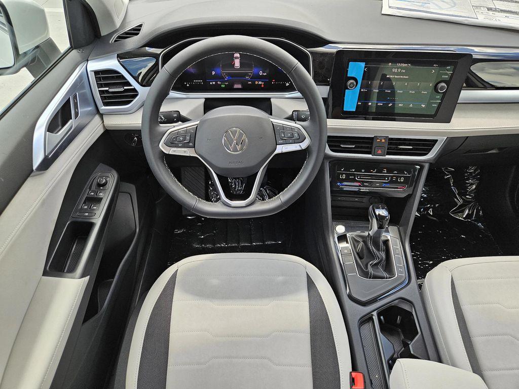 new 2025 Volkswagen Taos car, priced at $26,996