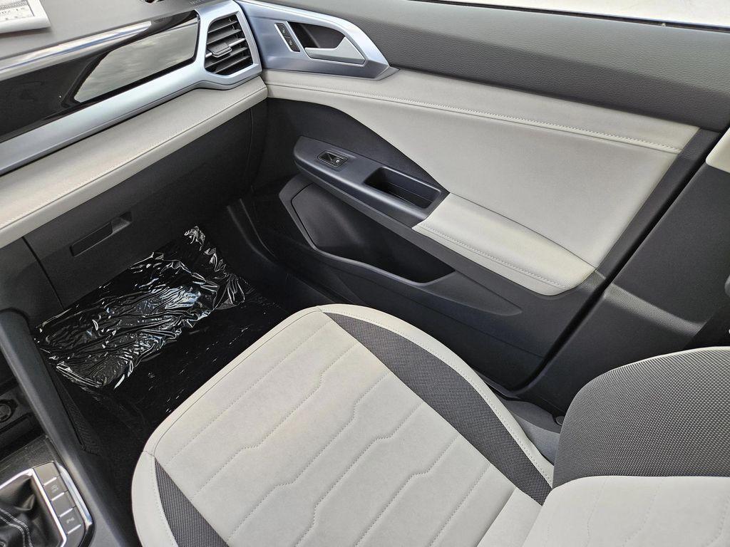 new 2025 Volkswagen Taos car, priced at $26,996