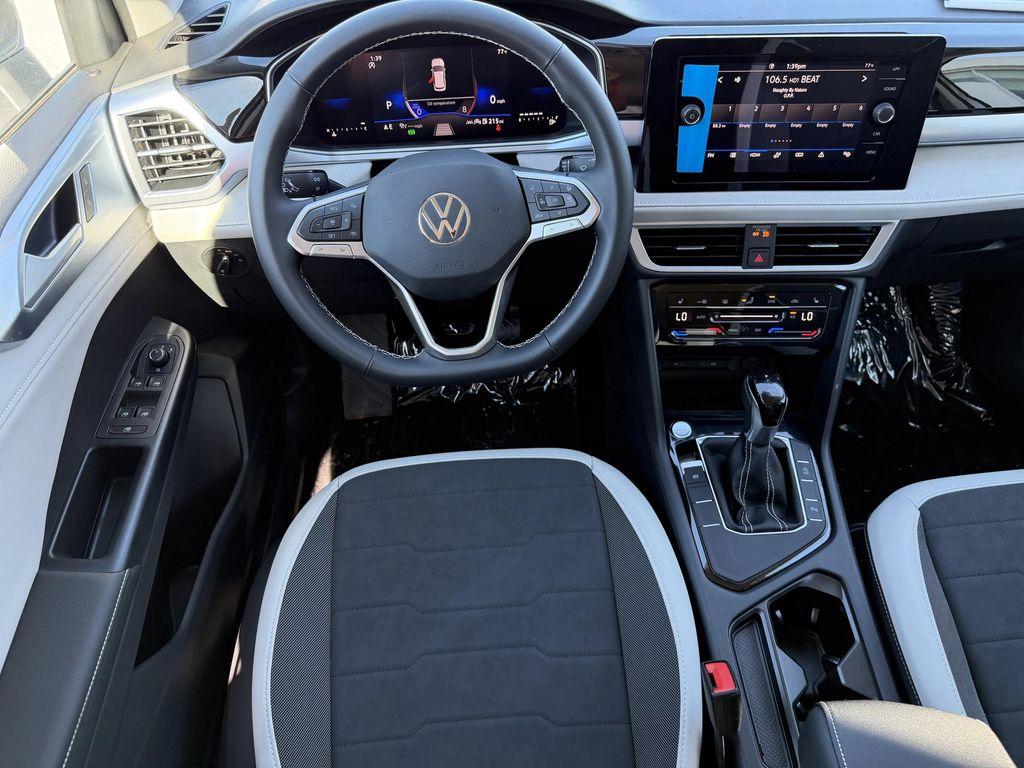 new 2025 Volkswagen Taos car, priced at $27,231
