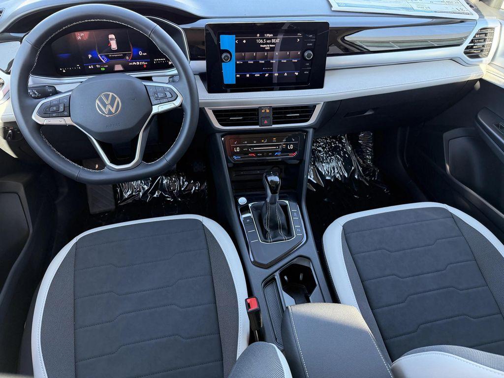 new 2025 Volkswagen Taos car, priced at $27,231