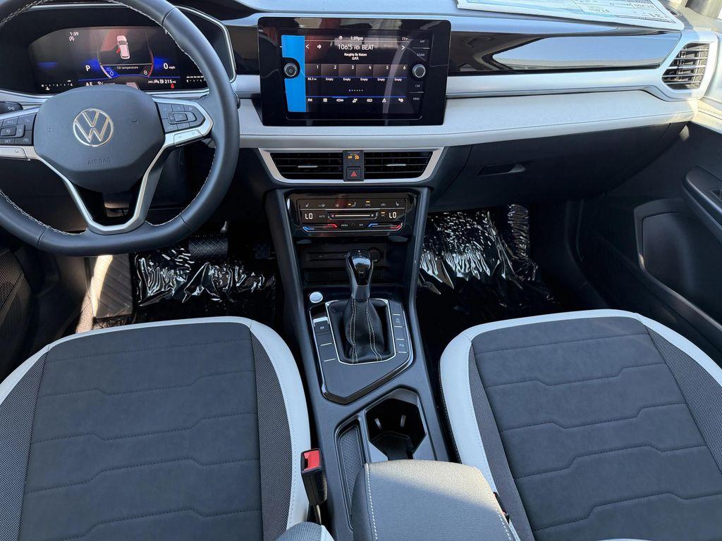 new 2025 Volkswagen Taos car, priced at $27,231