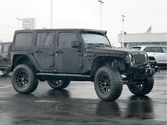 used 2016 Jeep Wrangler Unlimited car, priced at $25,959