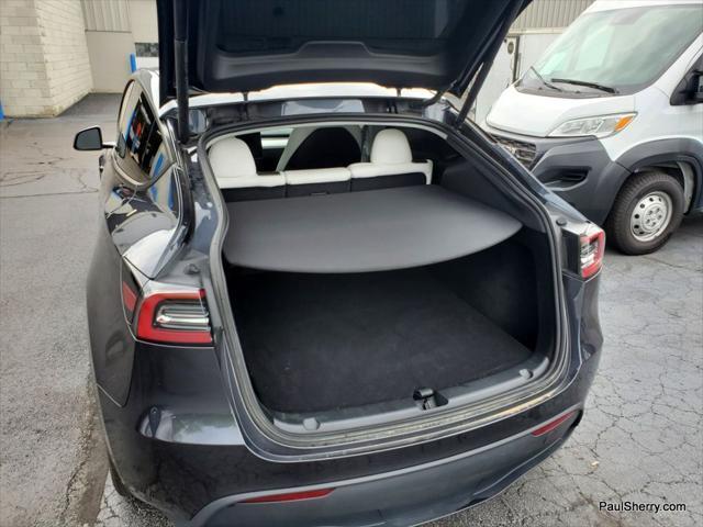 used 2024 Tesla Model Y car, priced at $36,050