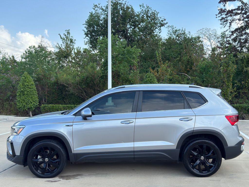 used 2023 Volkswagen Taos car, priced at $18,812