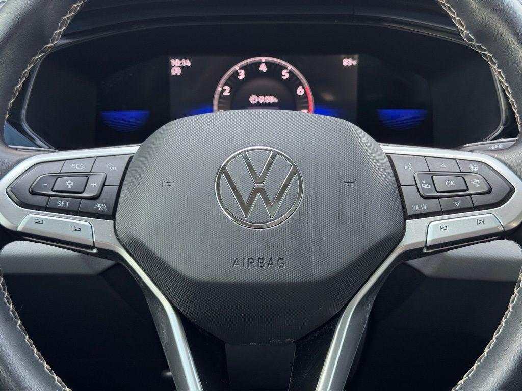 used 2023 Volkswagen Taos car, priced at $18,812