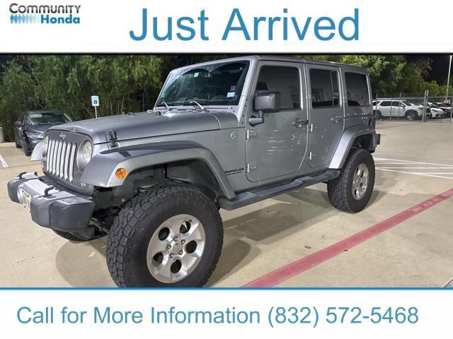 used 2014 Jeep Wrangler Unlimited car, priced at $17,817