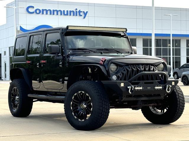 used 2014 Jeep Wrangler Unlimited car, priced at $17,810