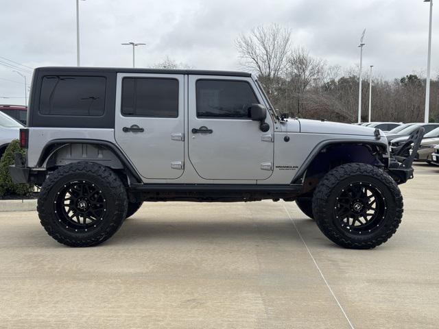 used 2014 Jeep Wrangler Unlimited car, priced at $18,449