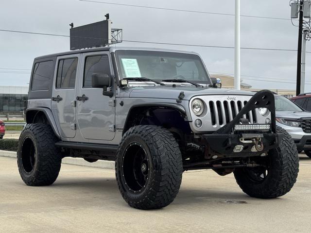 used 2014 Jeep Wrangler Unlimited car, priced at $18,449