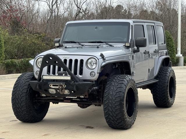 used 2014 Jeep Wrangler Unlimited car, priced at $18,449