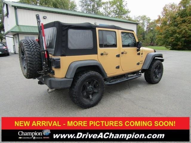 used 2013 Jeep Wrangler Unlimited car, priced at $15,423