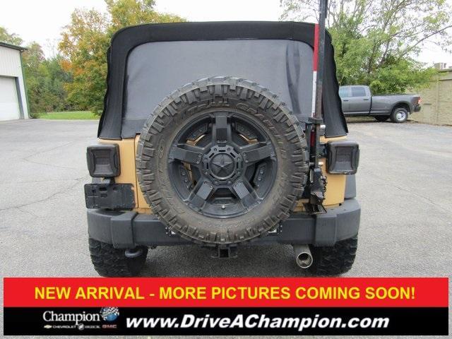used 2013 Jeep Wrangler Unlimited car, priced at $15,423