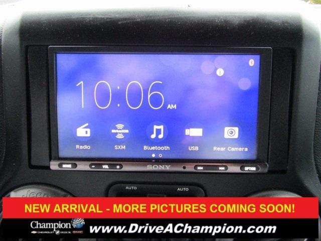 used 2013 Jeep Wrangler Unlimited car, priced at $15,423