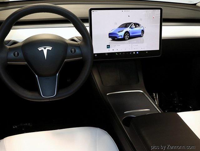 used 2023 Tesla Model Y car, priced at $31,103