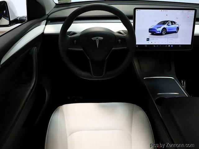 used 2023 Tesla Model Y car, priced at $31,103