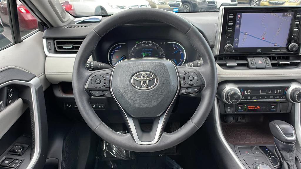 used 2021 Toyota RAV4 Hybrid car, priced at $27,995