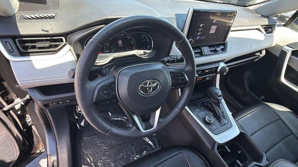 used 2023 Toyota RAV4 Hybrid car, priced at $30,977
