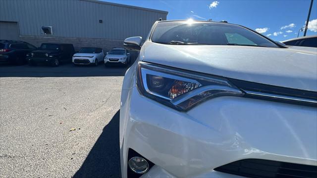 used 2018 Toyota RAV4 Hybrid car, priced at $27,995