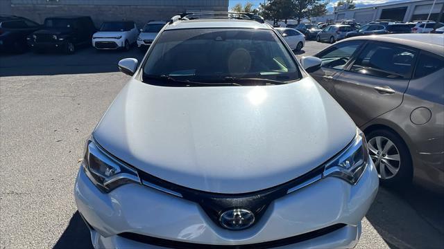 used 2018 Toyota RAV4 Hybrid car, priced at $27,995