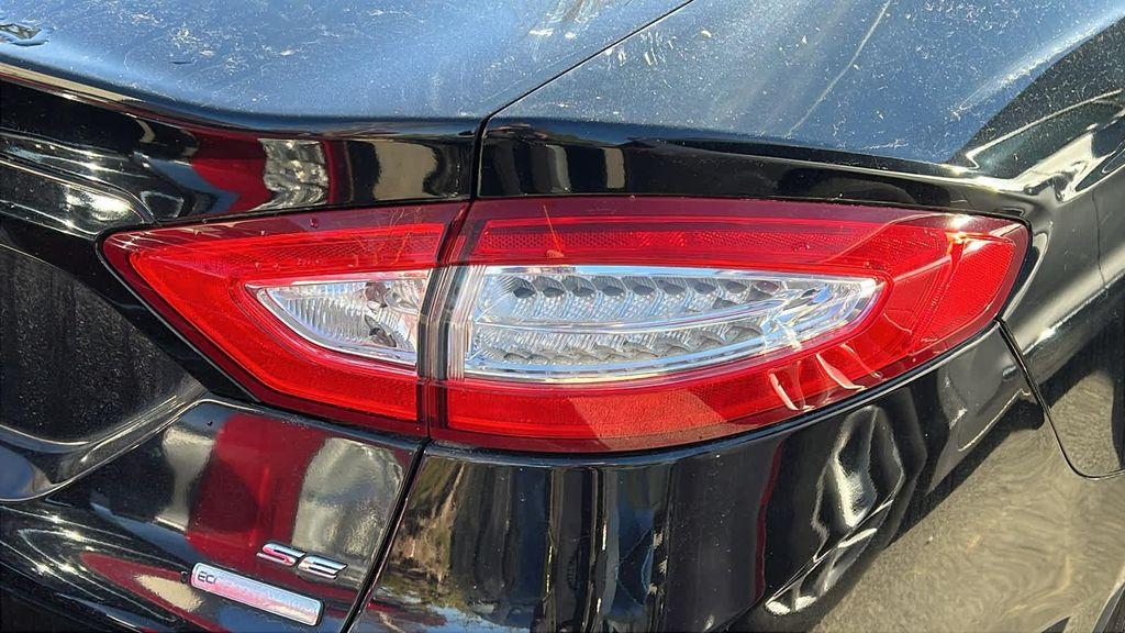 used 2016 Ford Fusion car, priced at $9,999